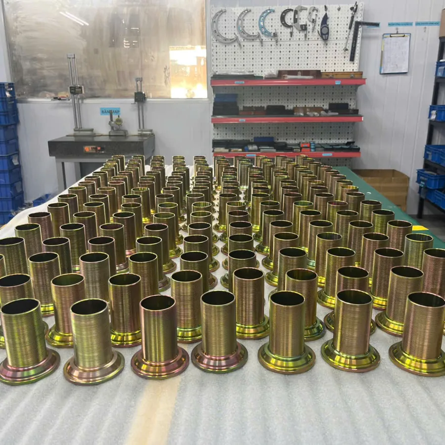 Batch of brass machined cylindrical bushings