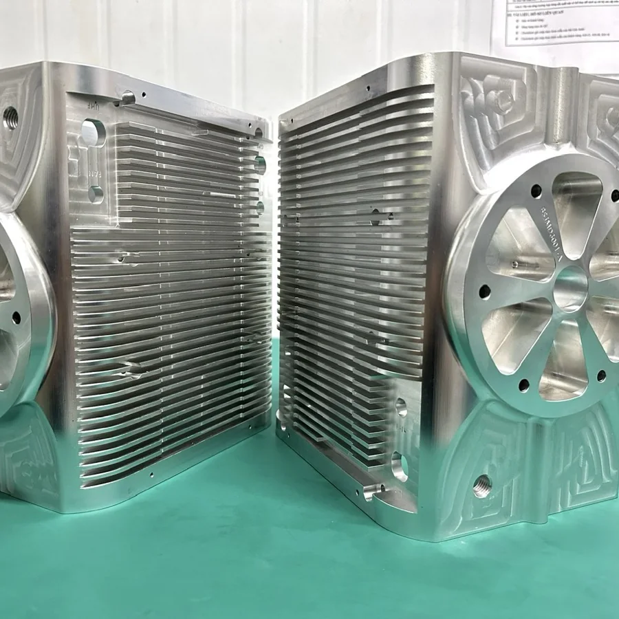 Aluminium finned motor housing machined on a 5-axis centre