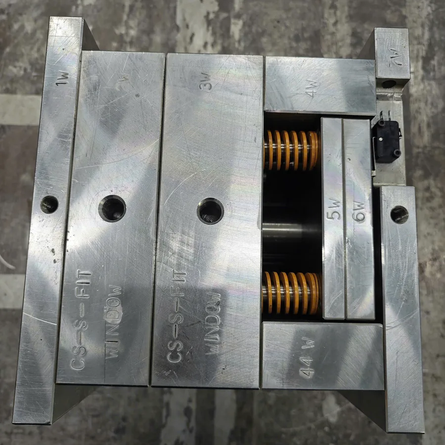 Hardened steel mould insert with ejector springs