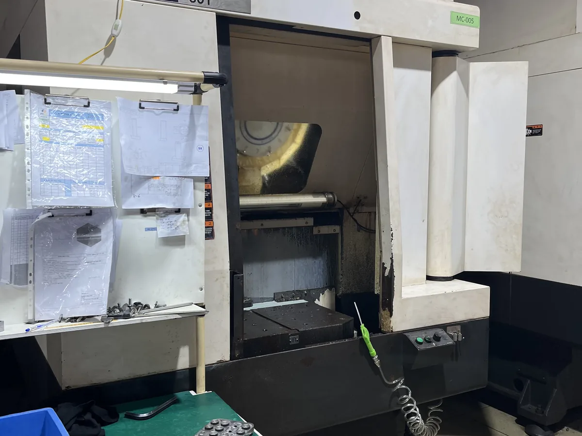 Wire EDM machine cutting hardened tool steel at Far East High Tech